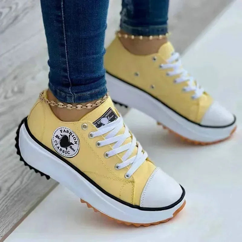 Chaussures motifs toile Femme