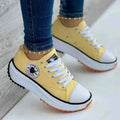 Chaussures motifs toile Femme